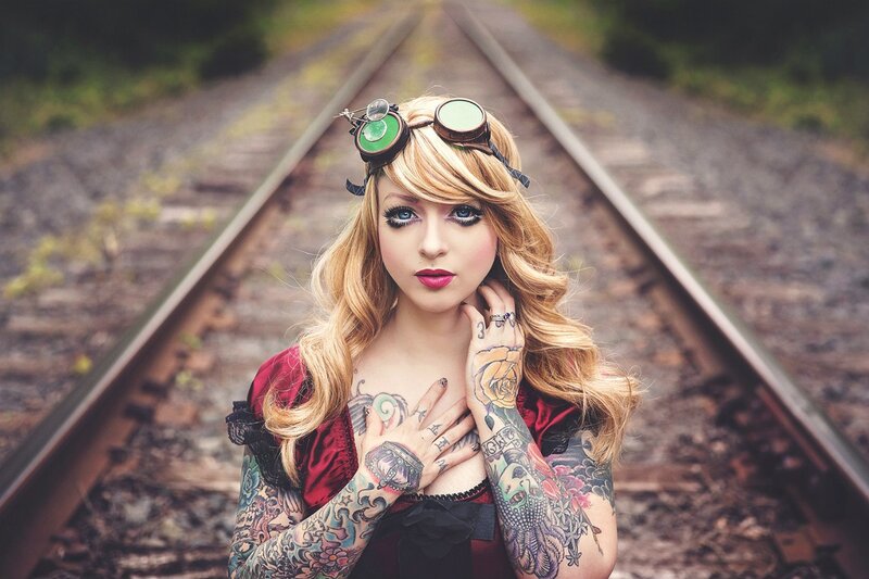 Tattooed Woman on Train Tracks