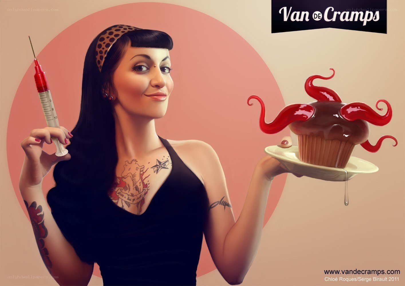 tattooed woman with cupcake