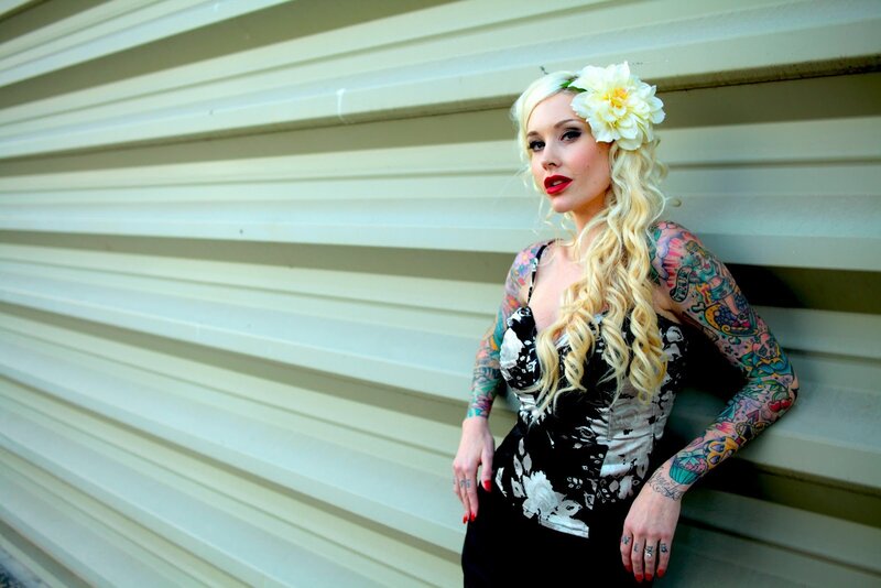 tattooed woman with flower