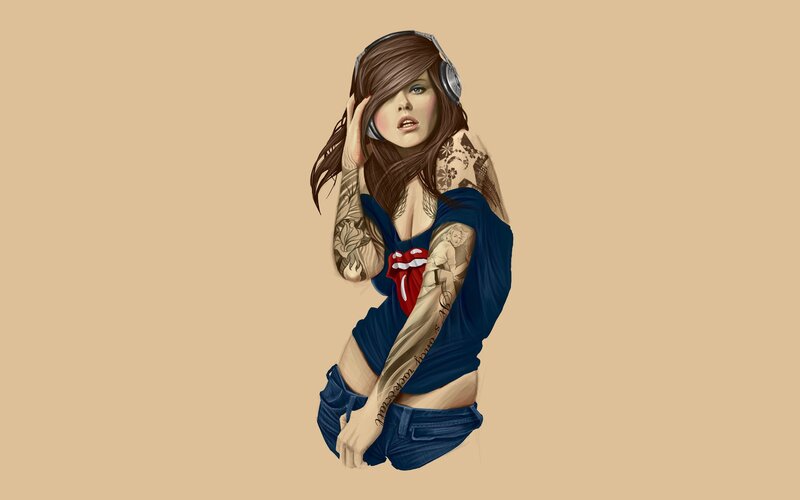 tattooed woman with headphones