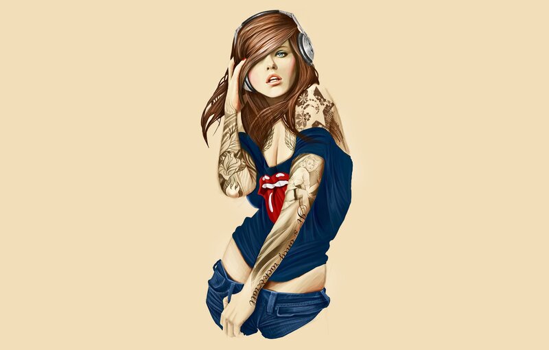 tattooed woman with headphones