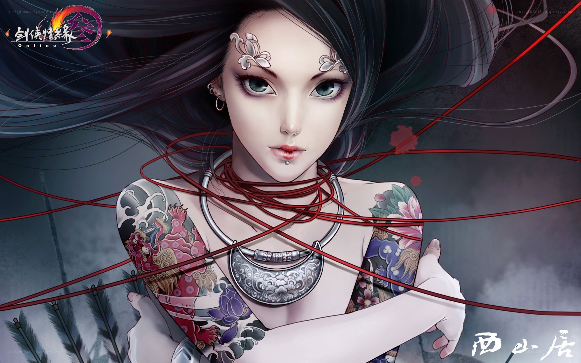 tattooed woman with red threads