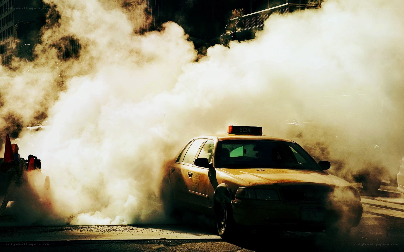 Taxi emitting thick smoke