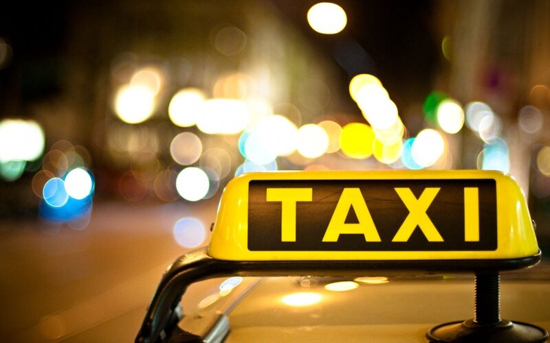 Taxi Sign at Night