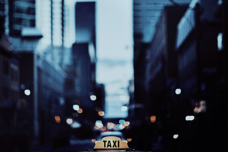 Taxi Sign in City