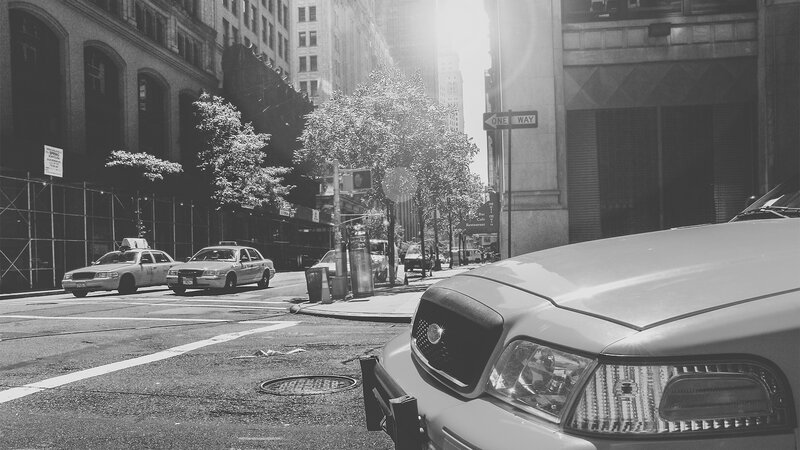 Taxis on City Street — Black