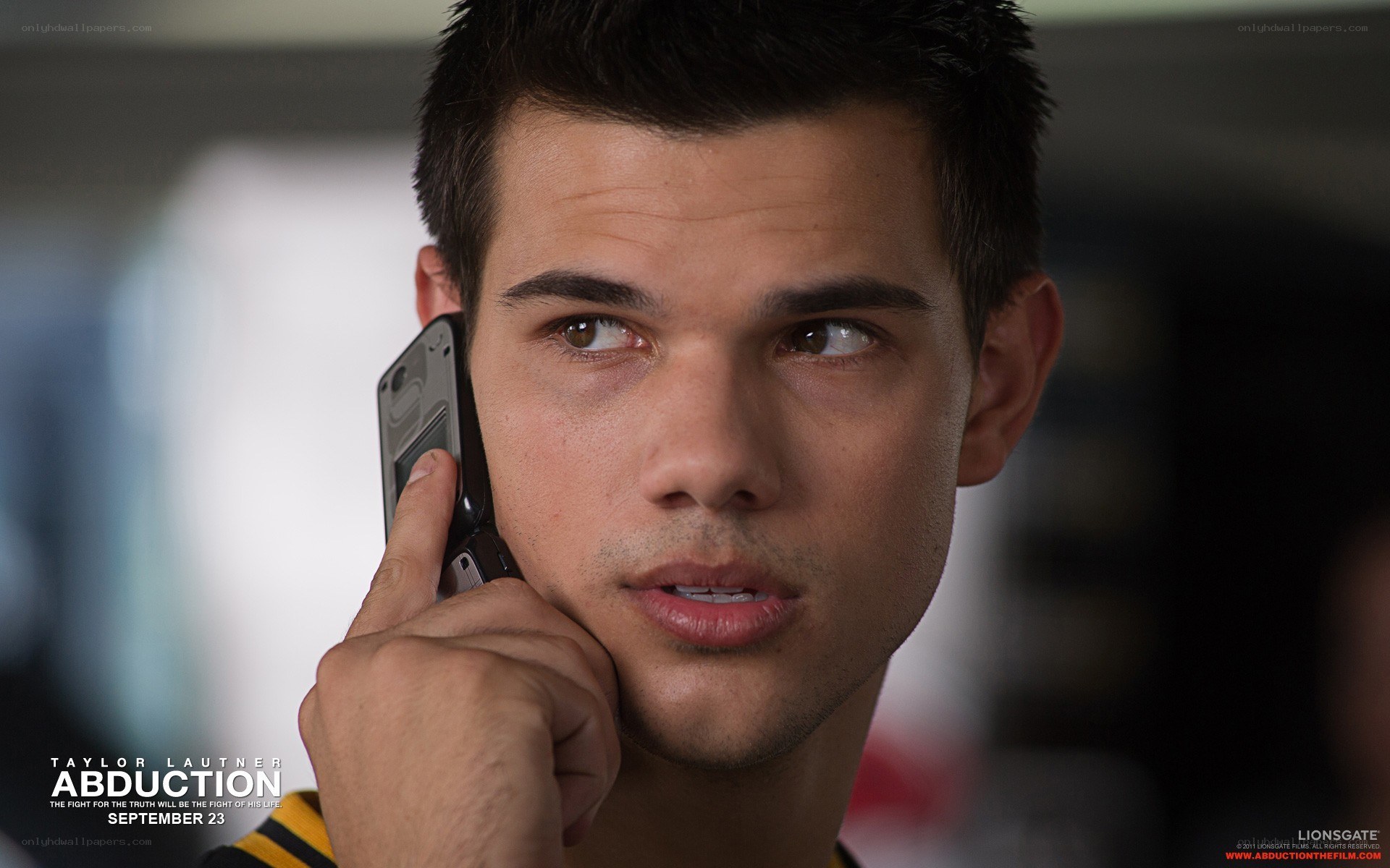 Taylor Lautner on phone