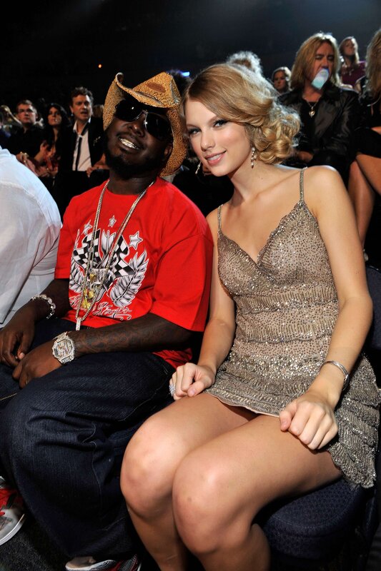 Taylor Swift and a celebrity at an event