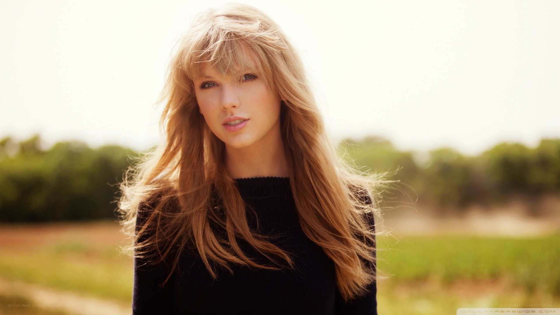 Taylor Swift in a field
