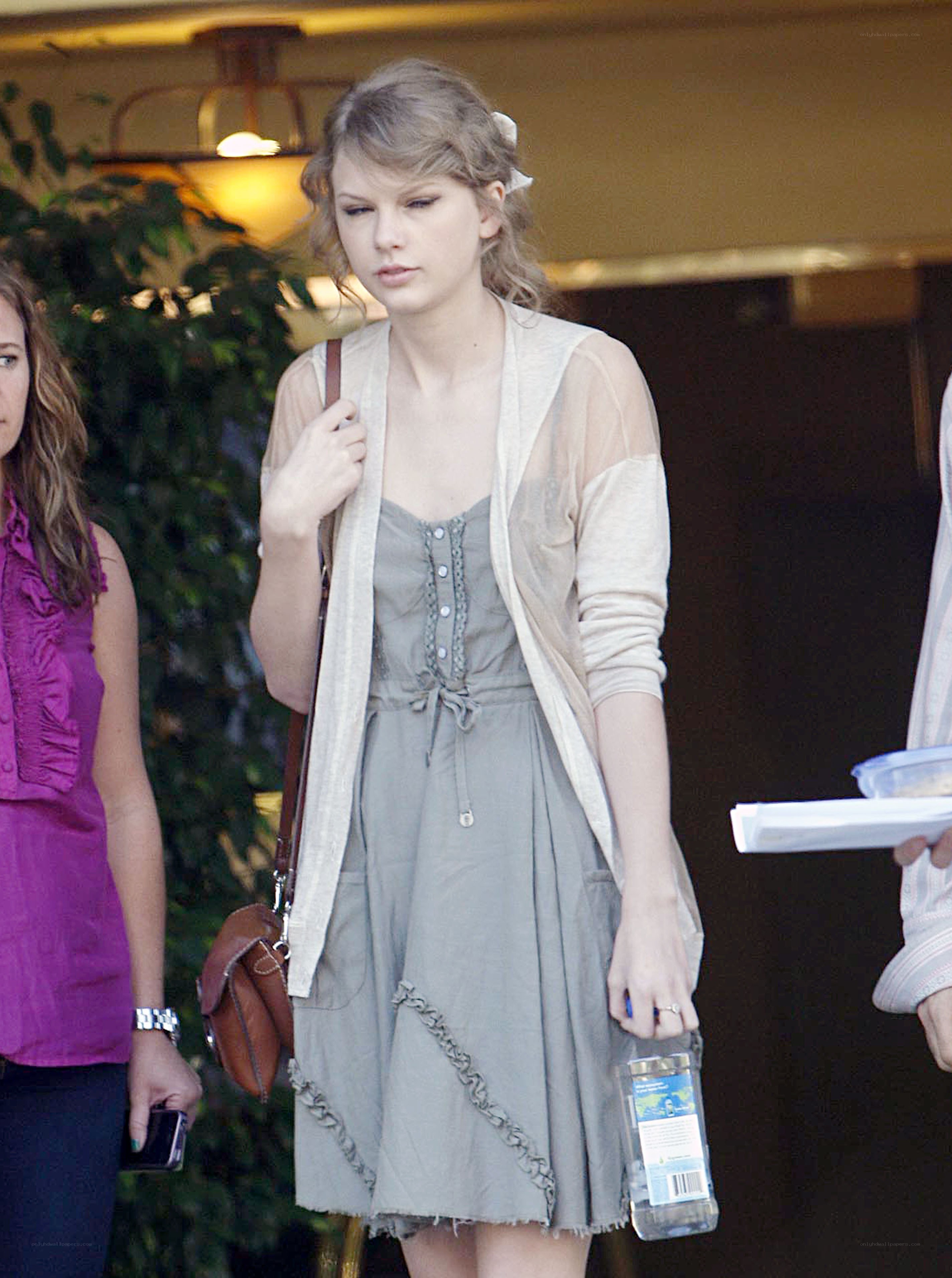 Taylor Swift in a gray dress
