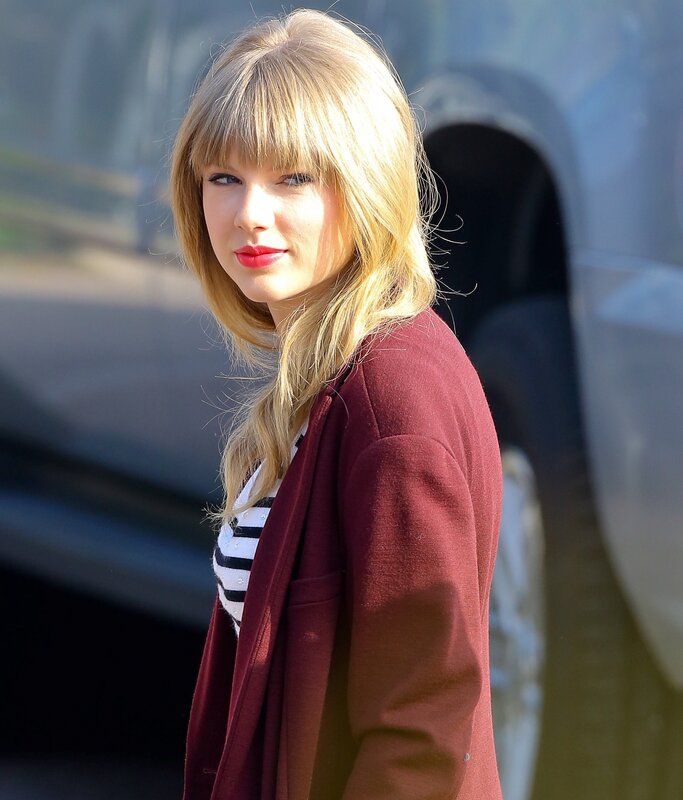 Taylor Swift in maroon cardigan