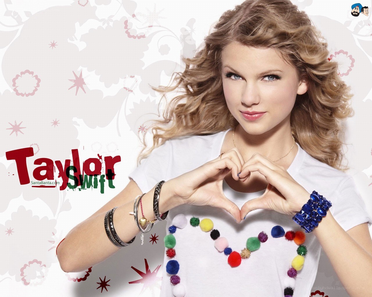 Taylor Swift making a heart