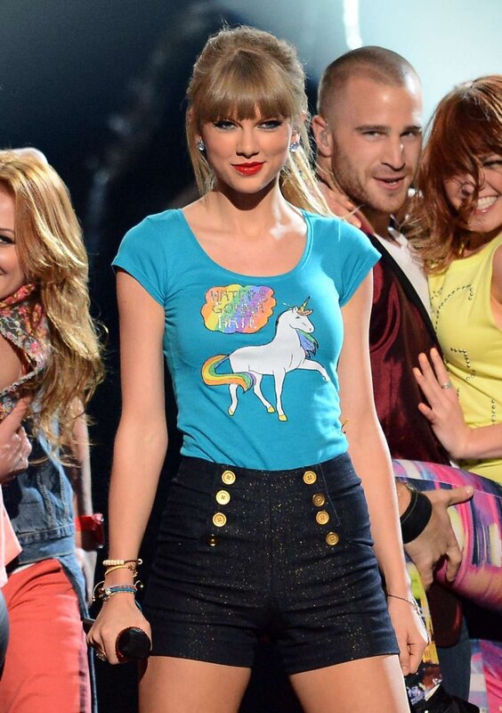 Taylor Swift on stage with unicorns
