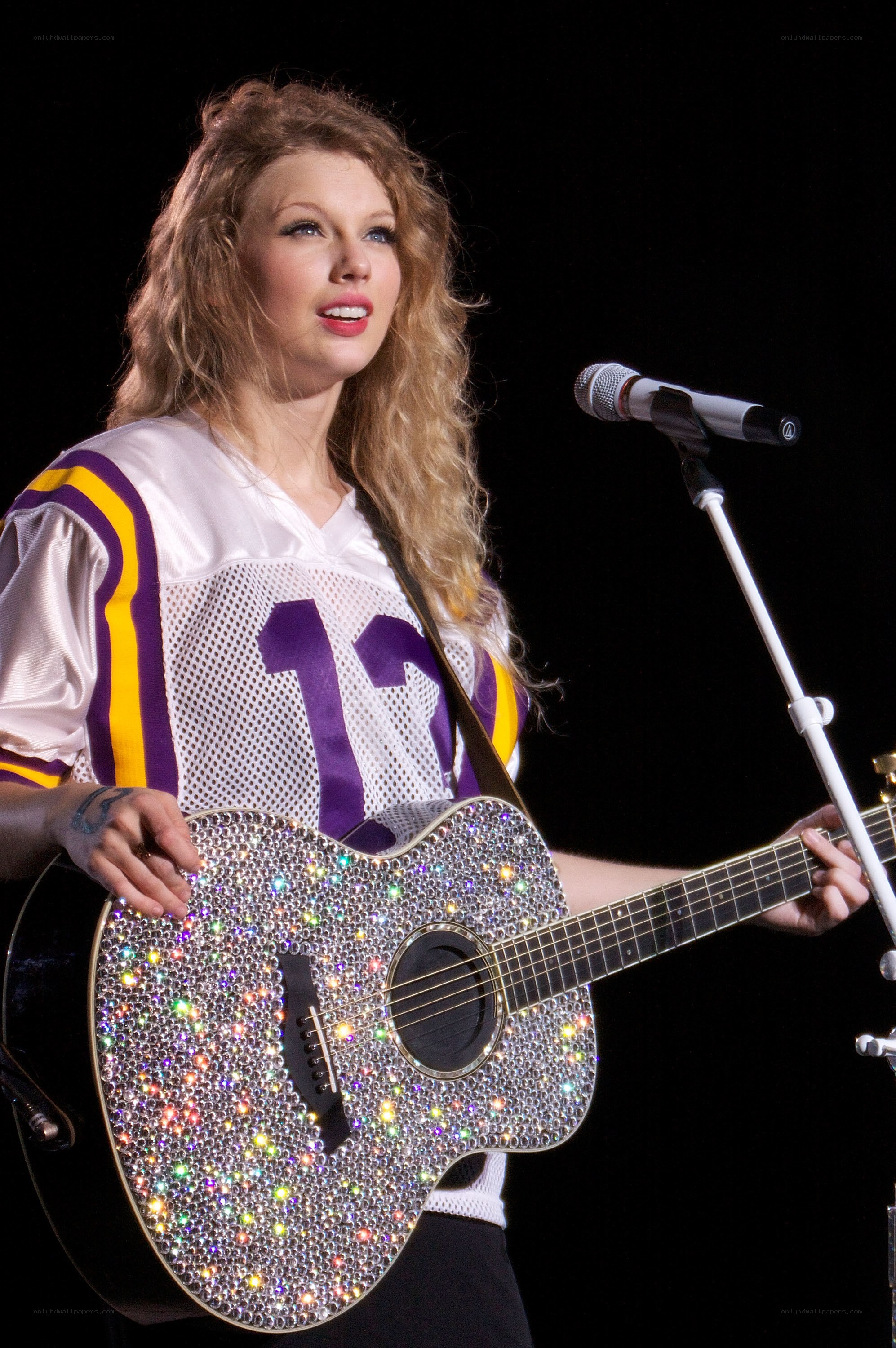 Taylor Swift performing on stage