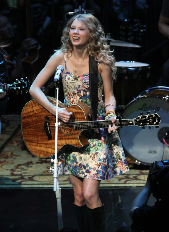 Taylor Swift performing on stage