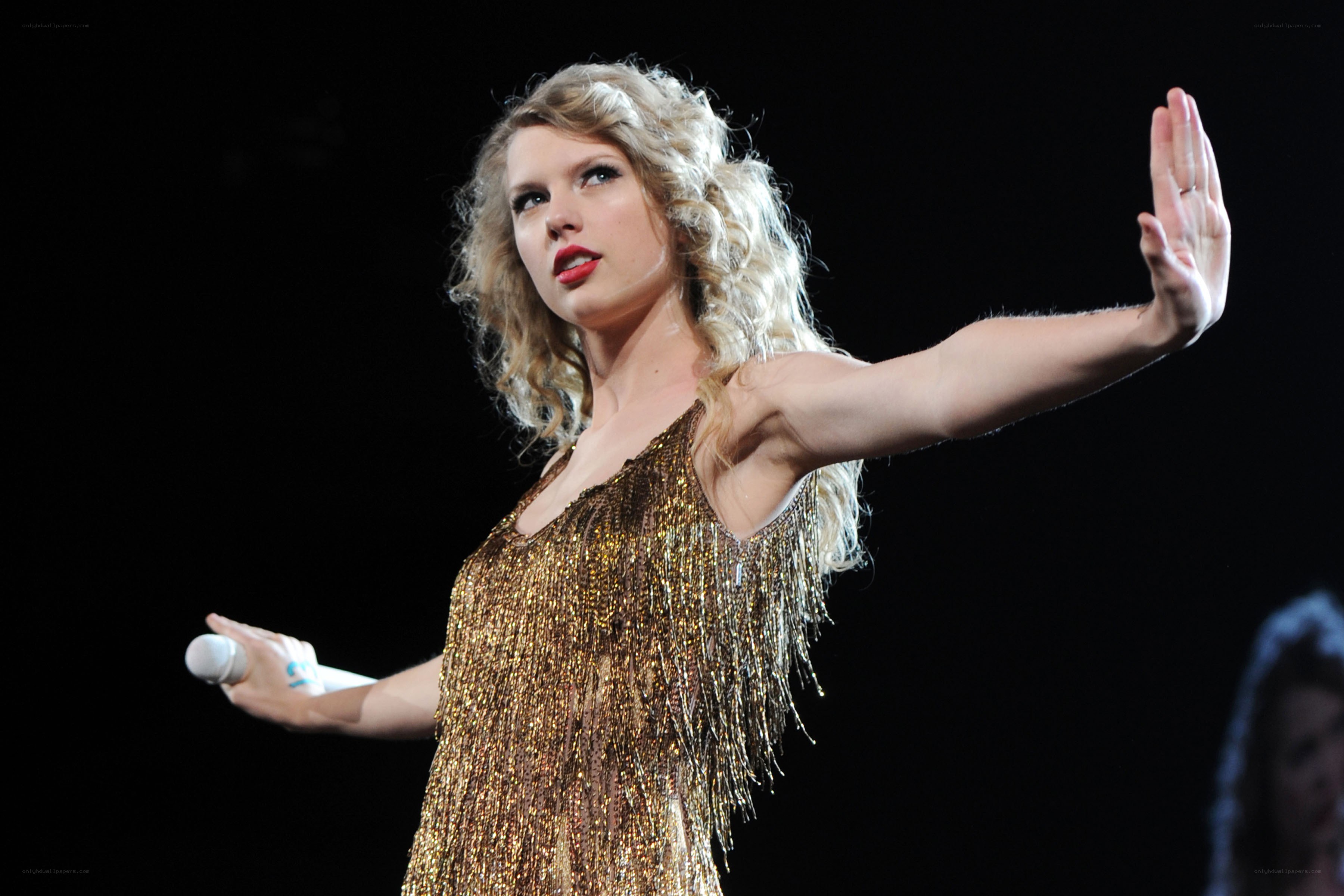 Taylor Swift performing on stage