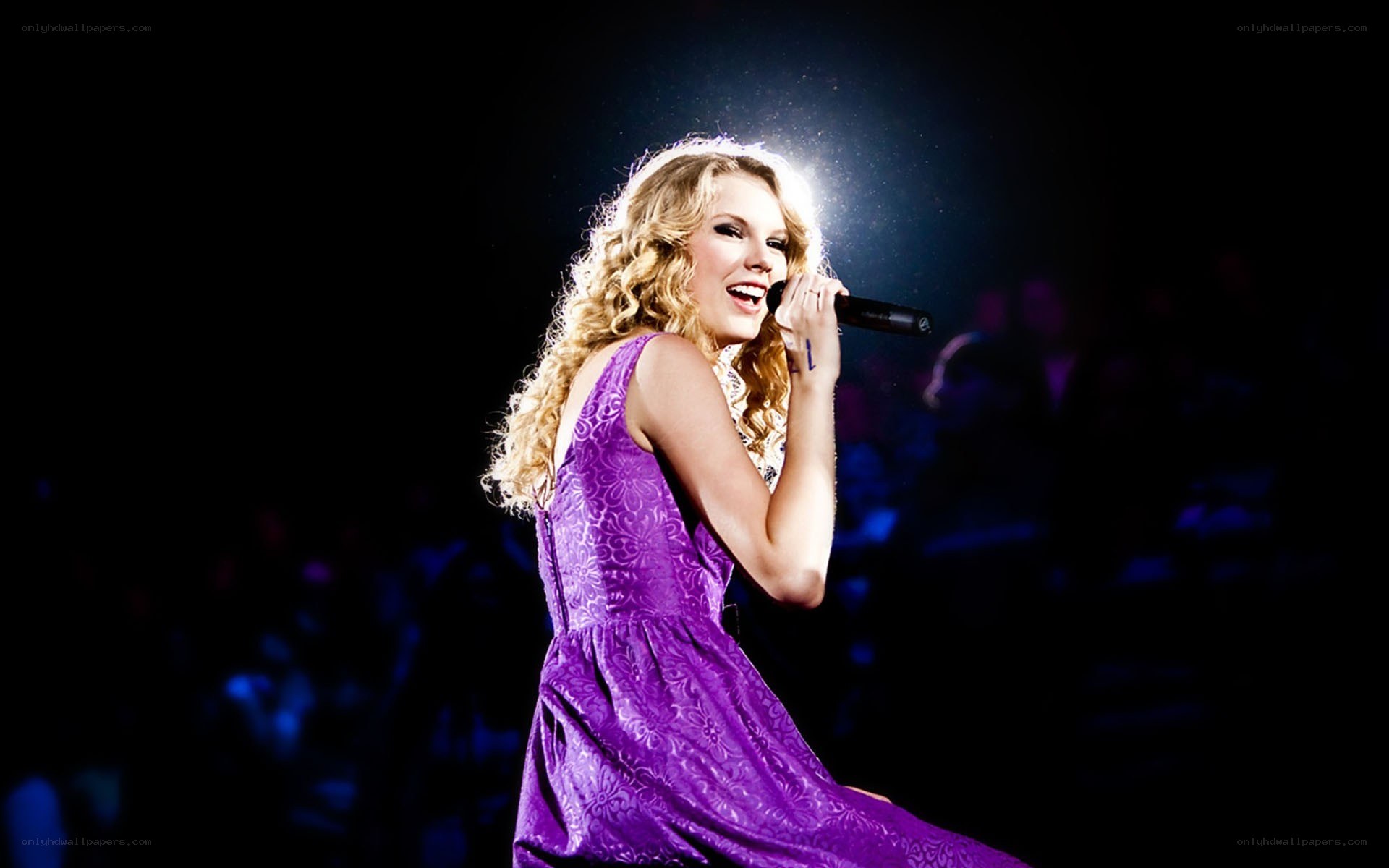 Taylor Swift performing on stage