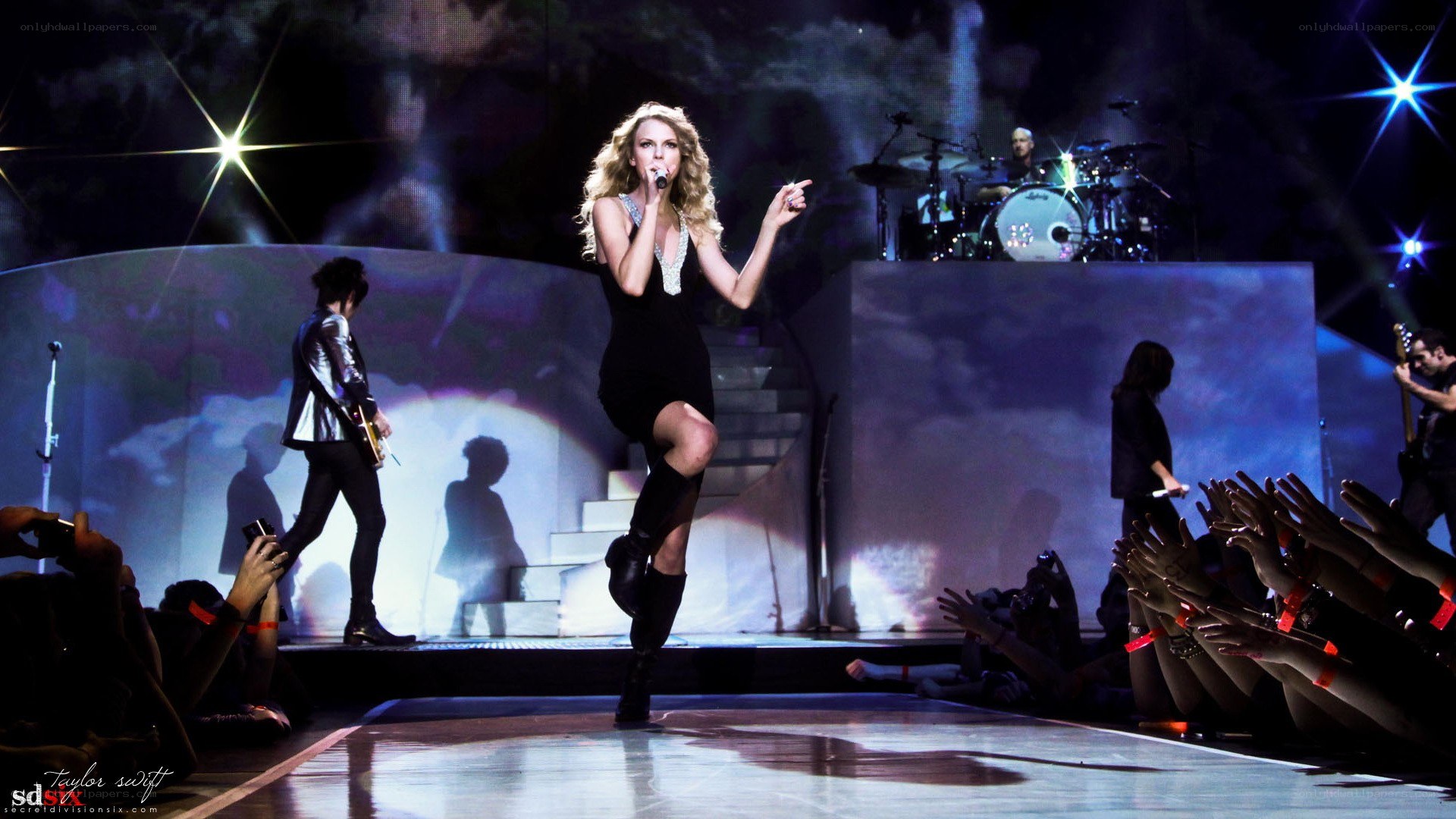 Taylor Swift performing on stage