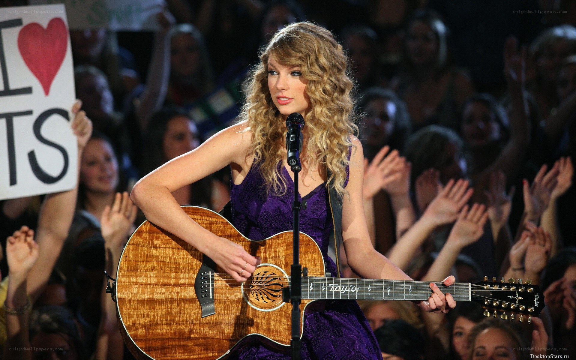 Taylor Swift performing on stage