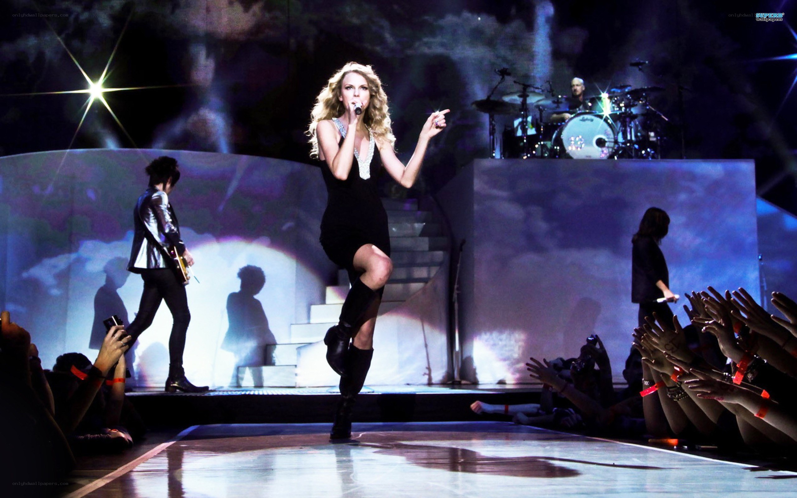 Taylor Swift performing on stage
