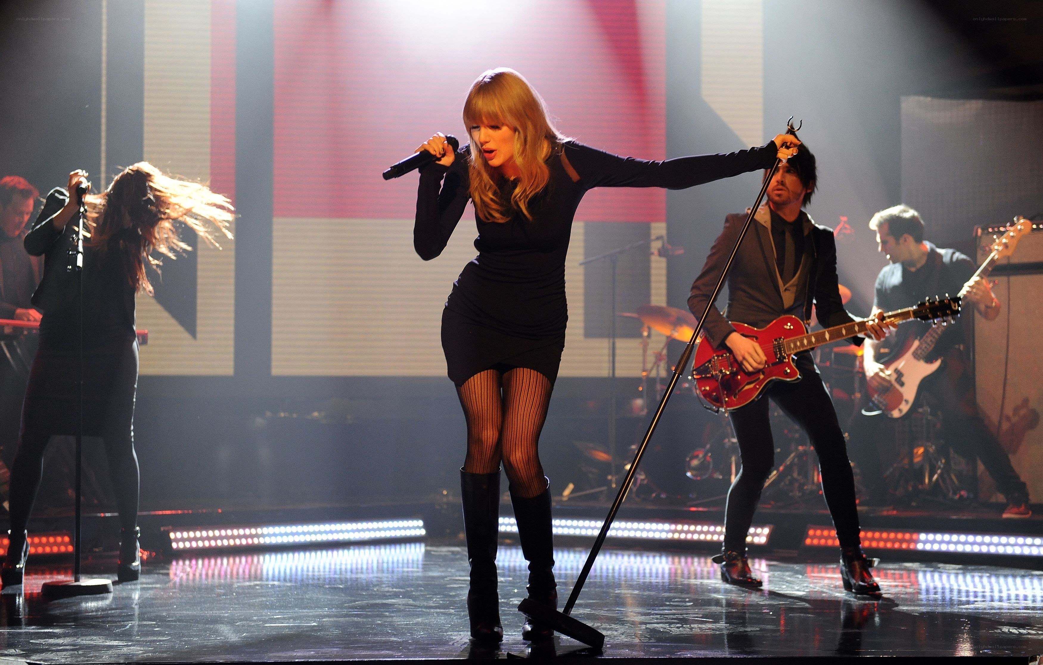 Taylor Swift performing on stage