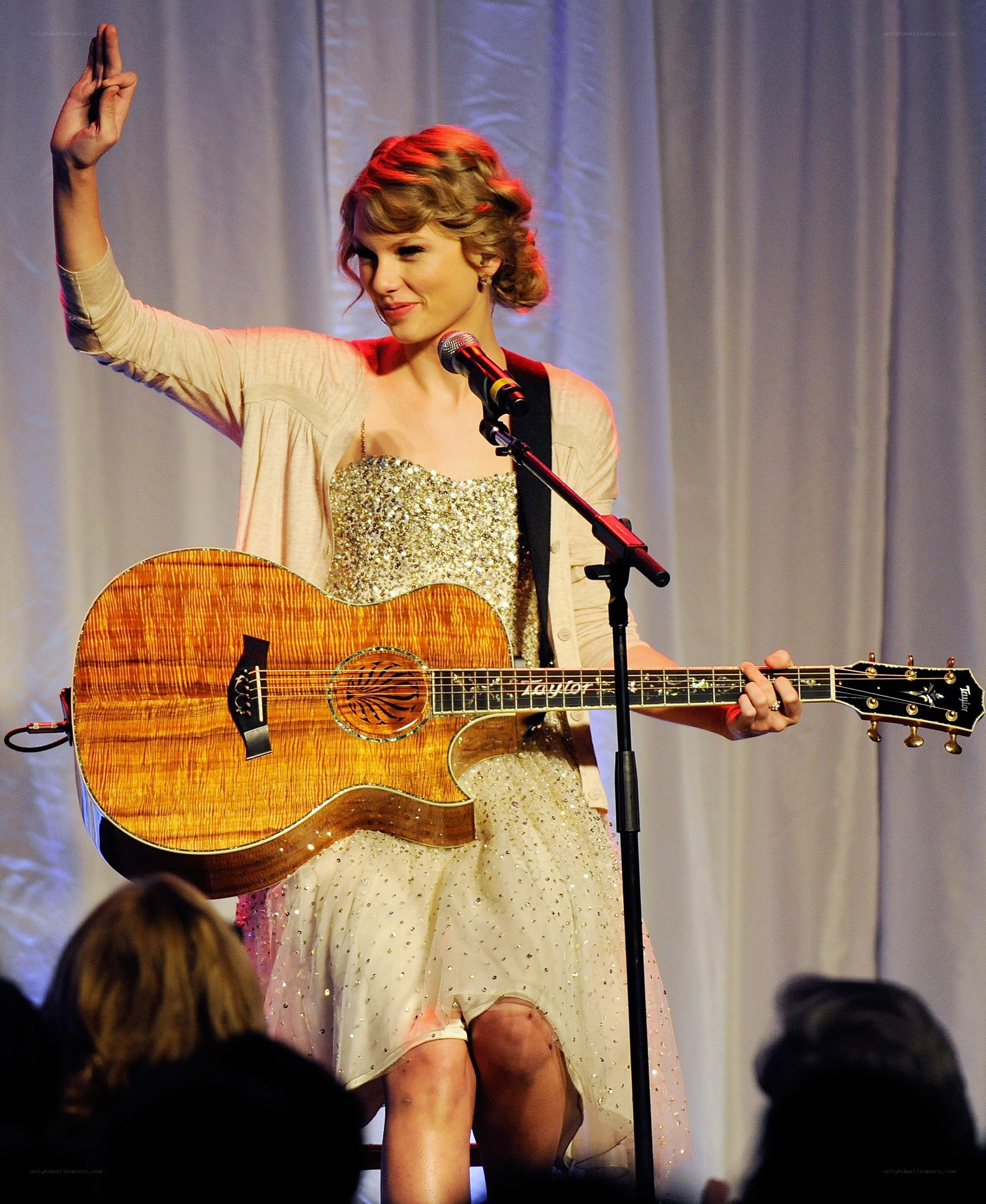 Taylor Swift performing on stage