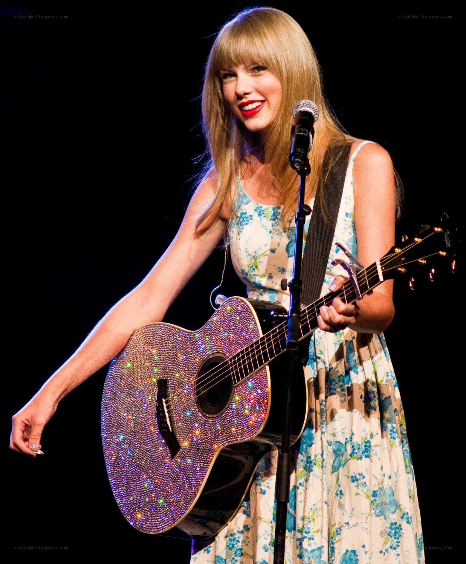 Taylor Swift performing on stage