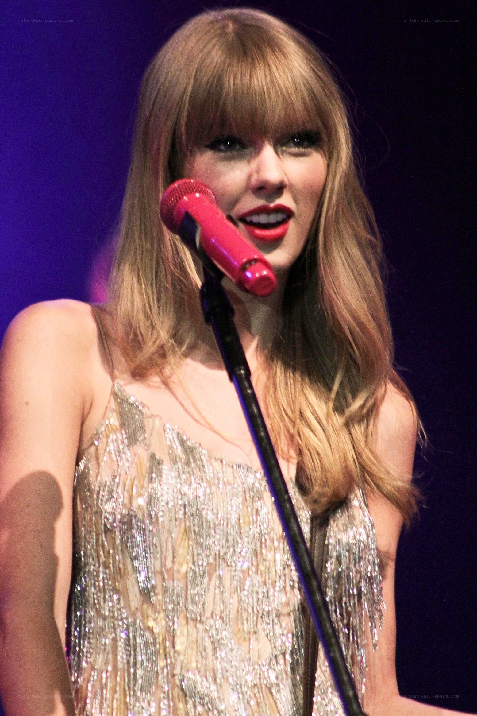 Taylor Swift performing on stage