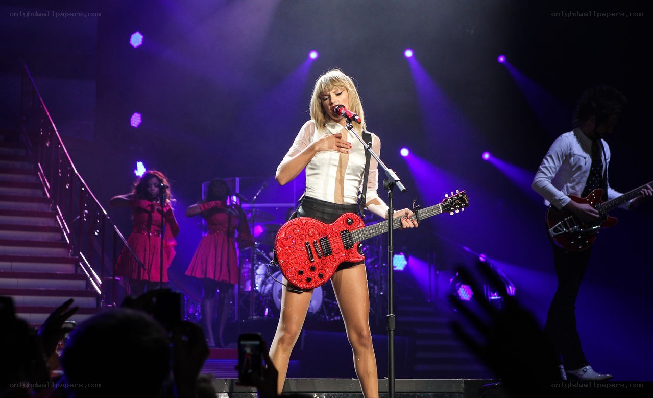 Taylor Swift performing on stage
