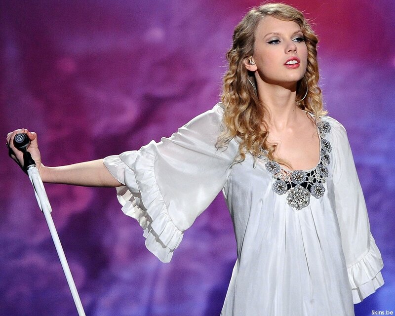 Taylor Swift performing on stage