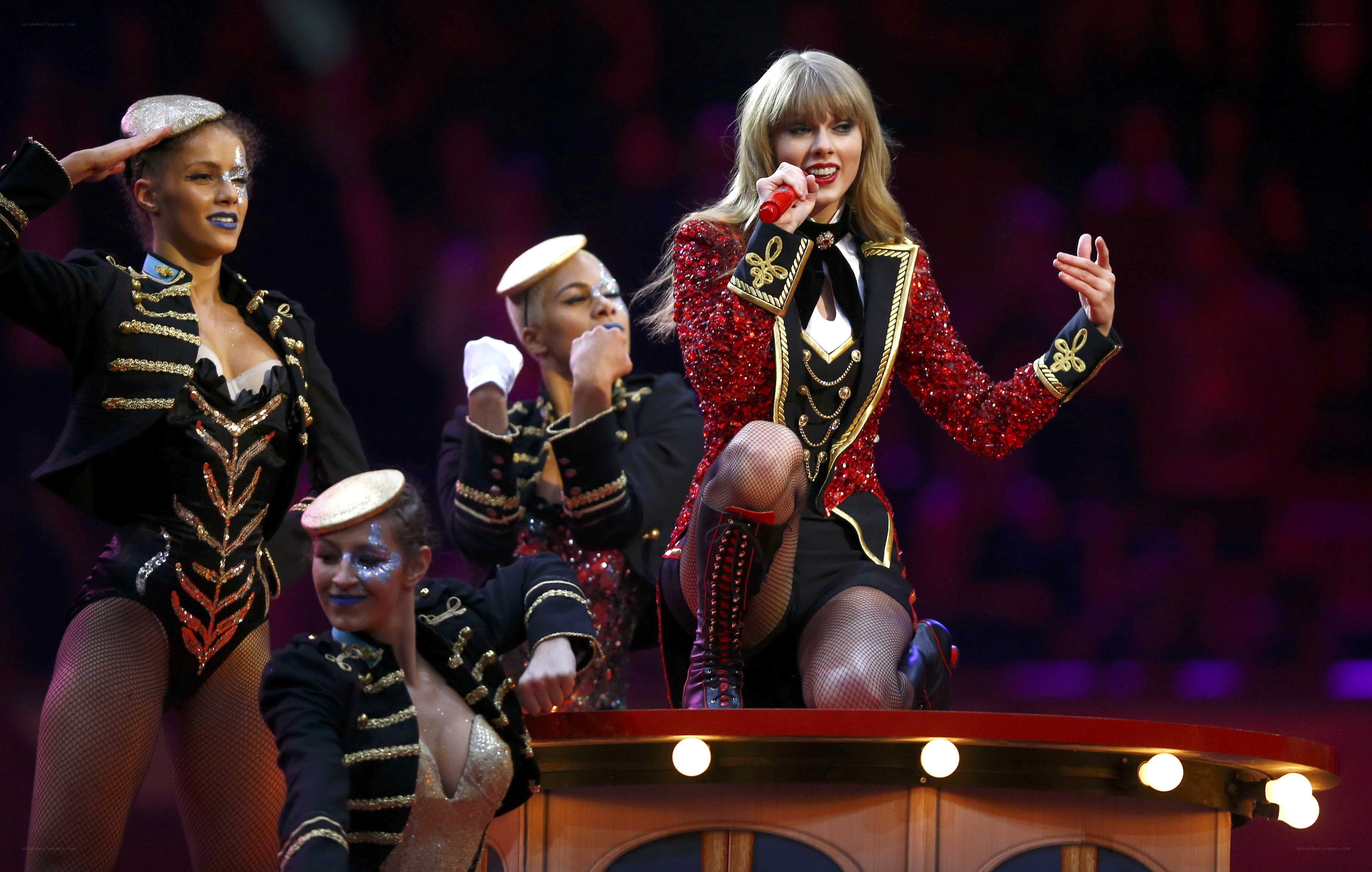 Taylor Swift performs on stage