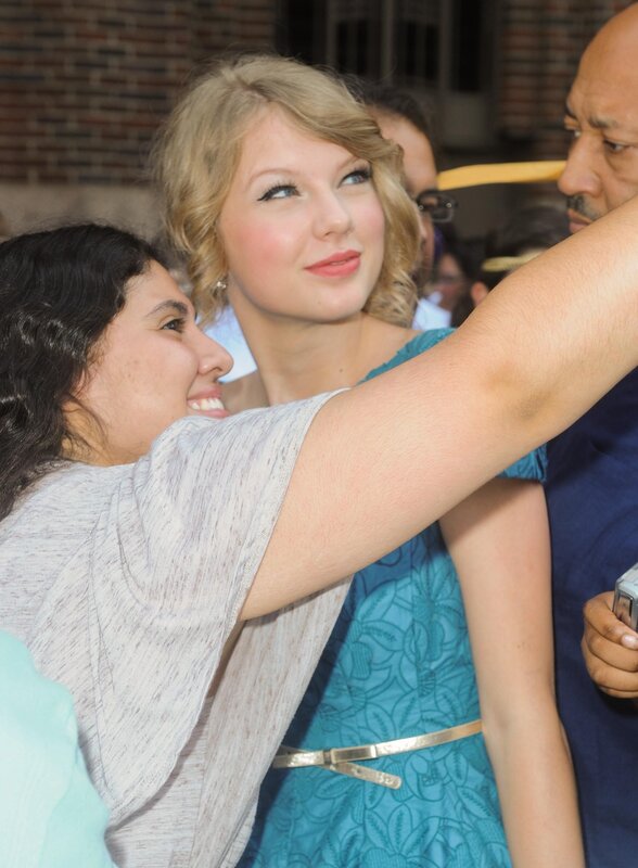 Taylor Swift taking a selfie