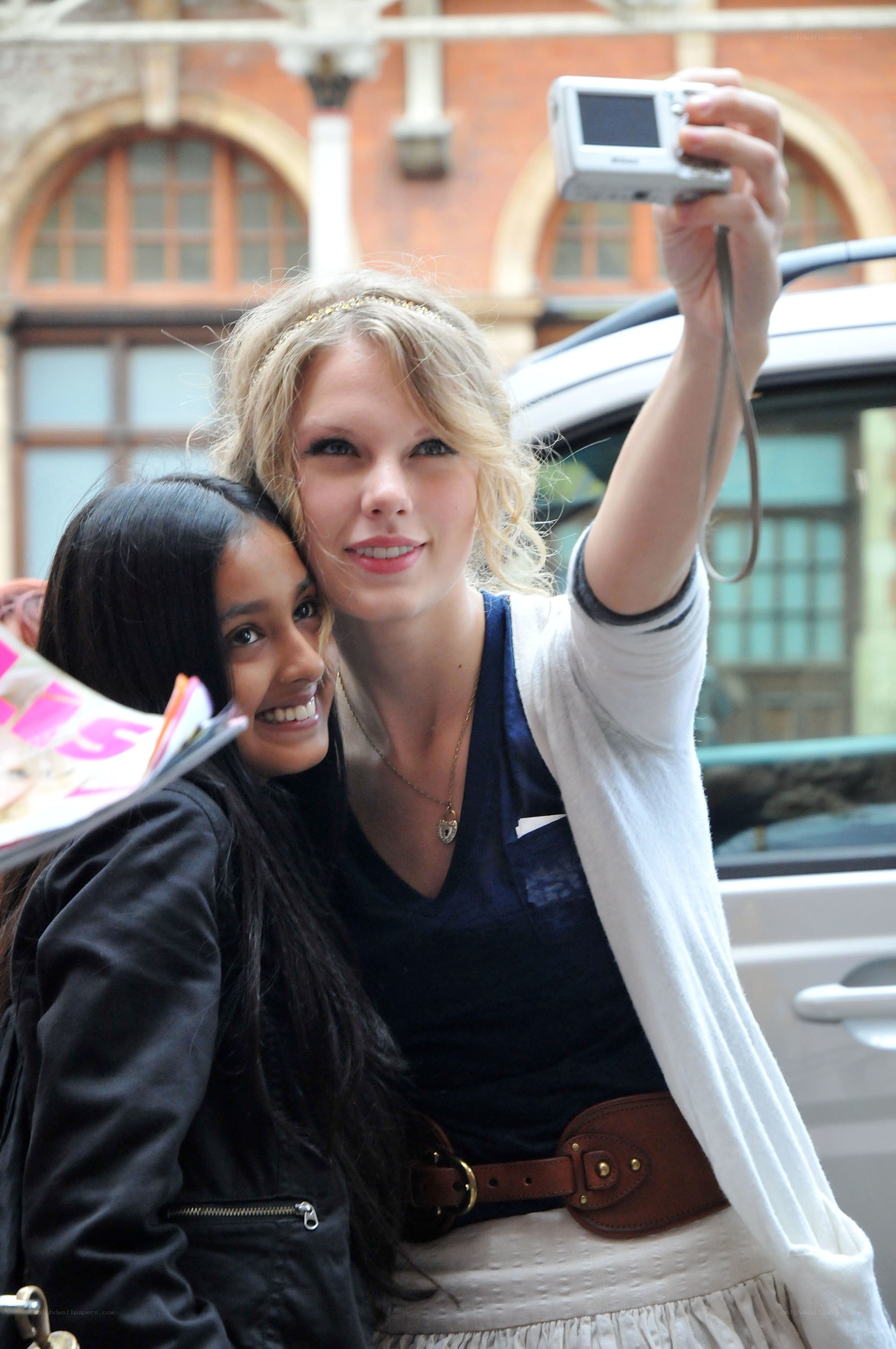 Taylor Swift taking a selfie