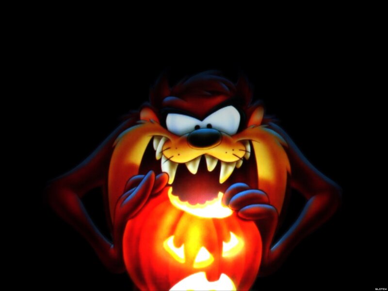 Taz Holding a Pumpkin
