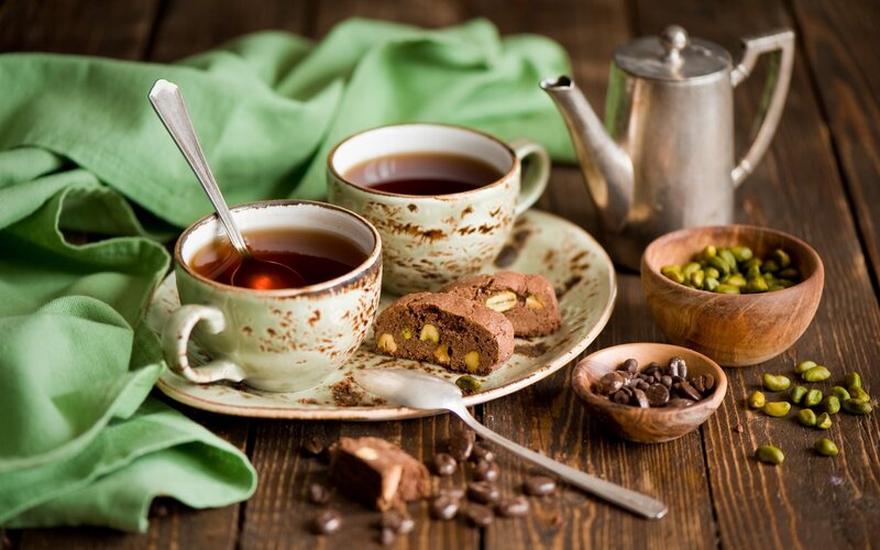 Tea and Cookies on Table — Brown