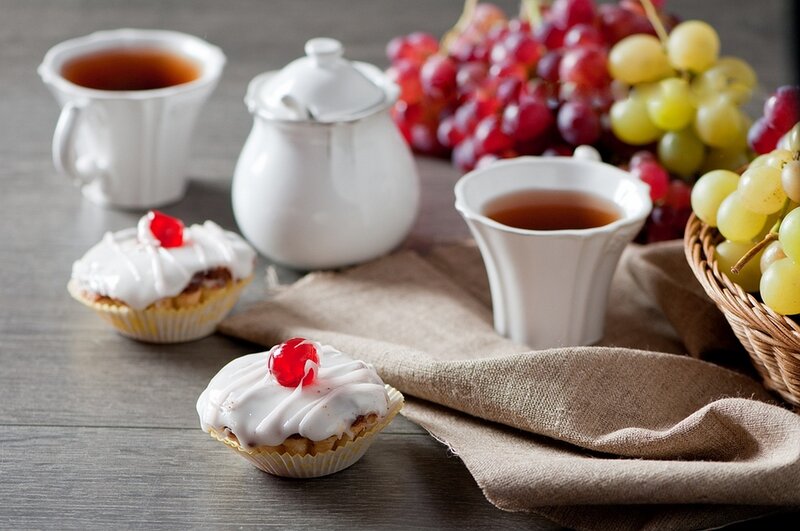 Tea and Cupcakes on Table