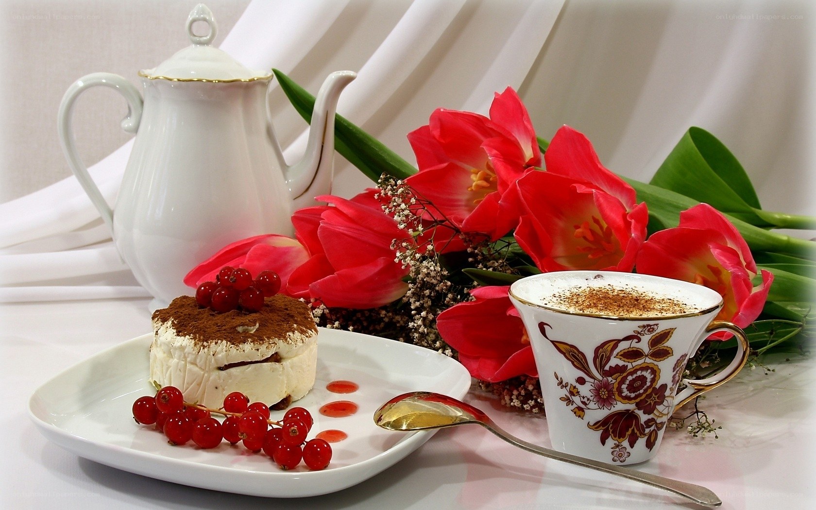 Tea and dessert with flowers