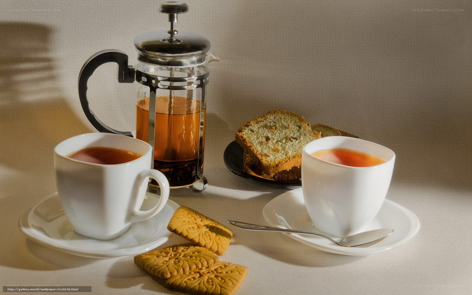 Tea and pastries on table