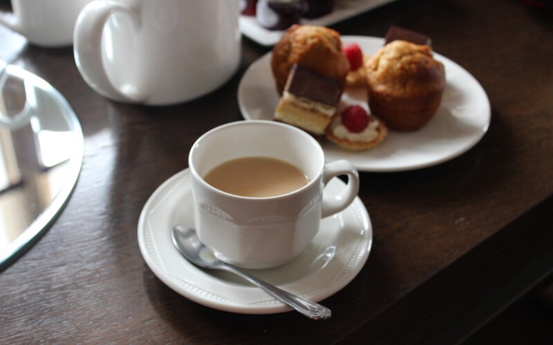 Tea and Pastries on Table — White, Calm, Morning