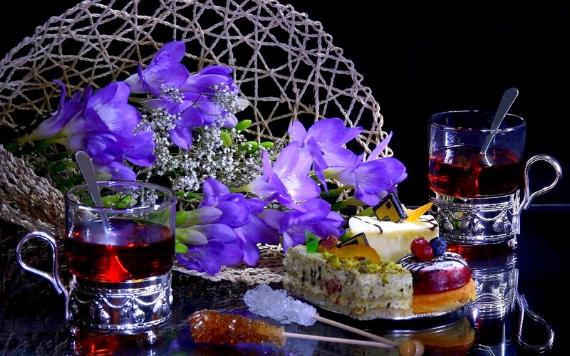 Tea and Pastries with Flowers