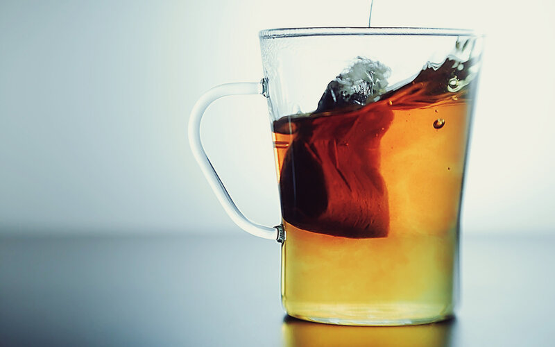 Tea Bag in Glass Cup — Brown