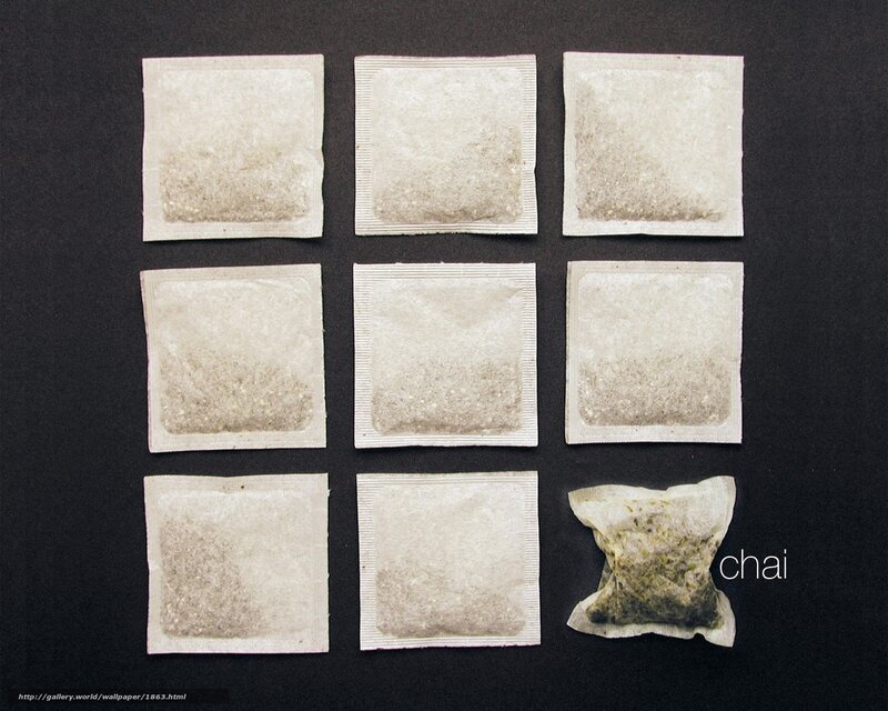 Tea bags on black background