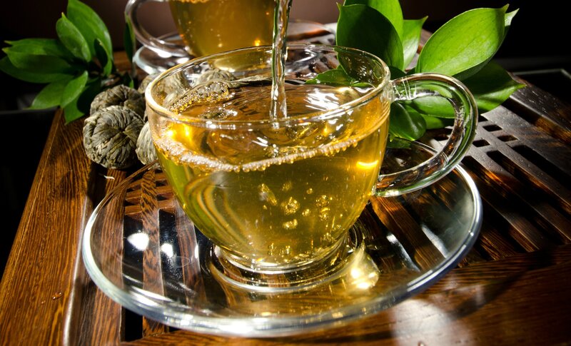 Tea Being Poured — Green