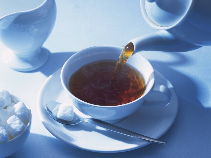 Tea Being Poured into Cup — Blue