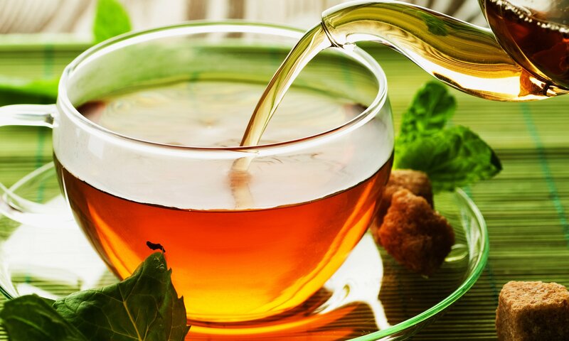 Tea Being Poured into Cup — Green, Calm