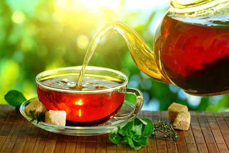 Tea Being Poured into Cup — Green, Serene, Morning