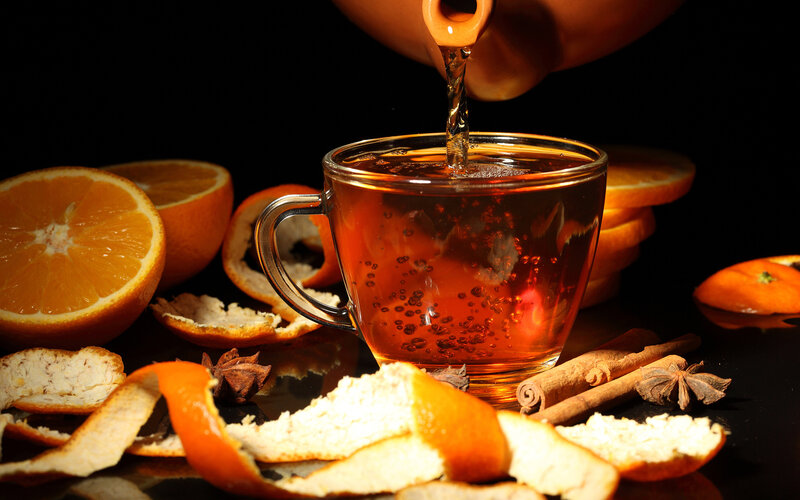 Tea Being Poured into Cup — Orange