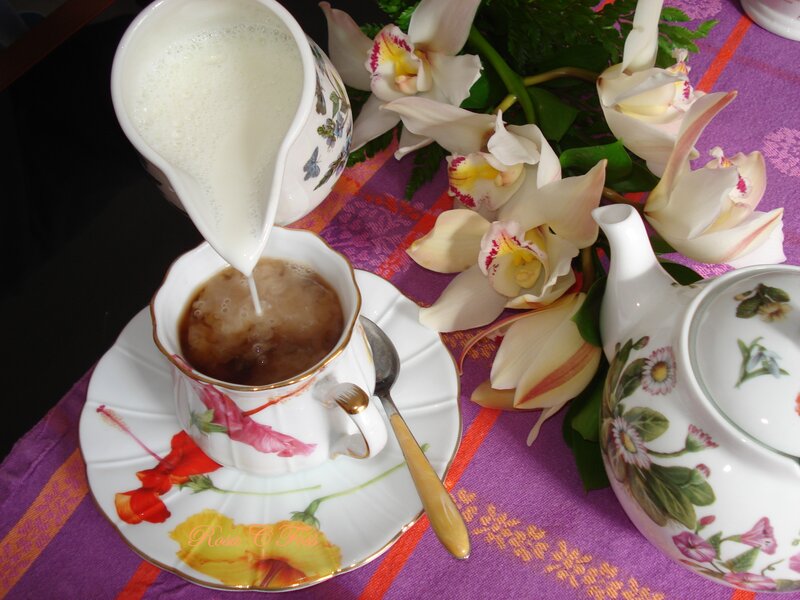 Tea Being Poured into Cup — Purple