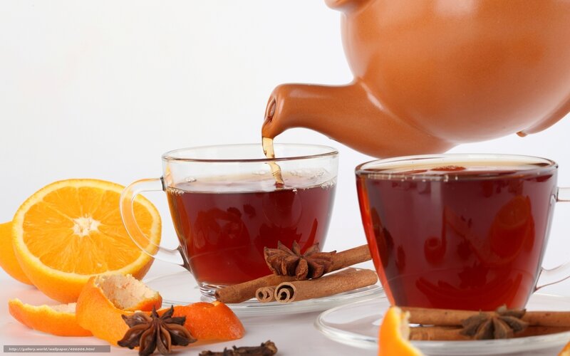 Tea being poured with spices
