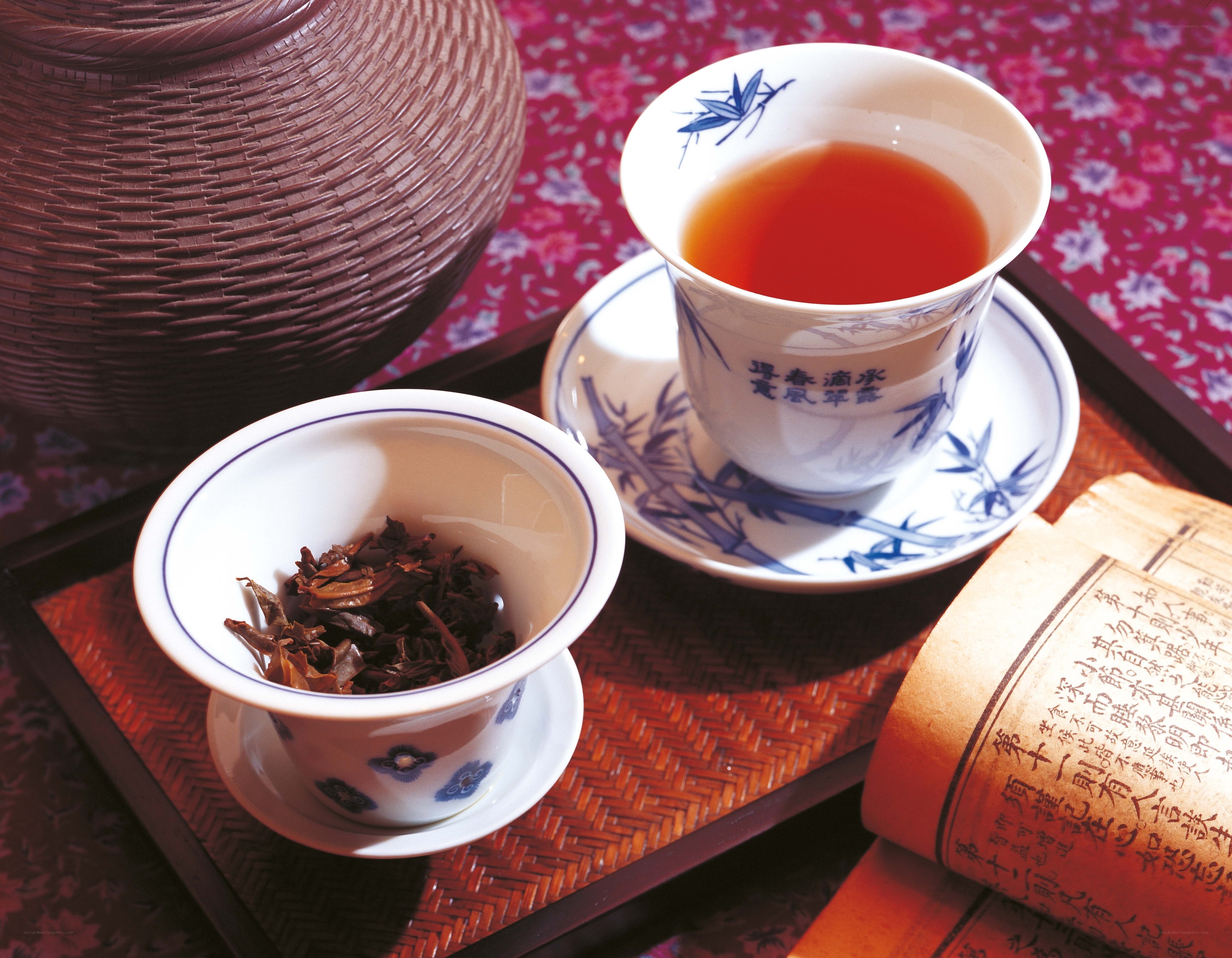 Tea ceremony setup with tea leaves